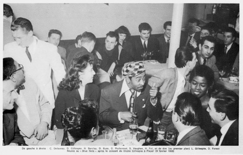 Dizzie Gillespie (at far left, with glasses, looking up), Don Byas (thumbs up) and Sarah Vaughan, together again, but now in Paris, 1953. 